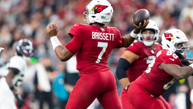 Jacoby Brissett stands on the field during a Cardinals game against the Jaguars.