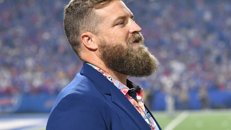 Ryan Fitzpatrick stands on the sideline before a Bills game against the Buccaneers. Kyler Murray