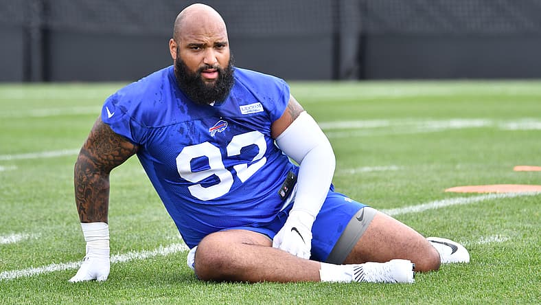 DaQuan Jones stretches during Buffalo Bills training camp in Pittsford. Vikings rumors