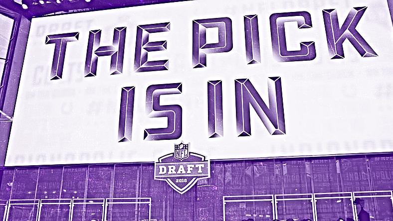 The Pick Is In" banner displayed at NFL Draft event with purple theme.