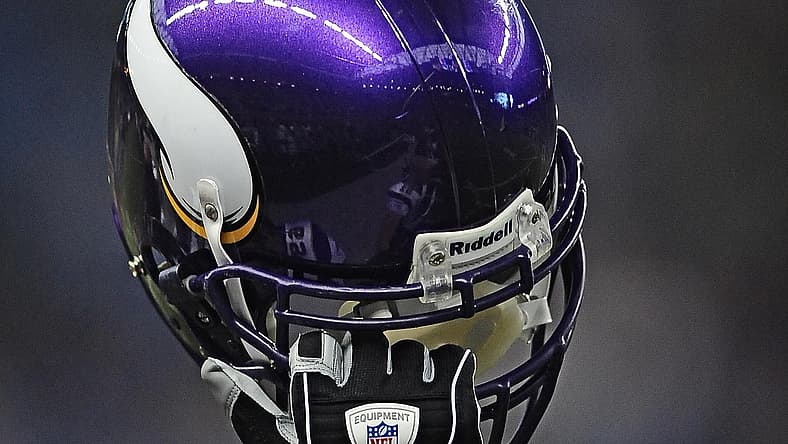 A Minnesota Vikings helmet rests on the sideline before a game against the Detroit Lions at Ford Field in Detroit.
