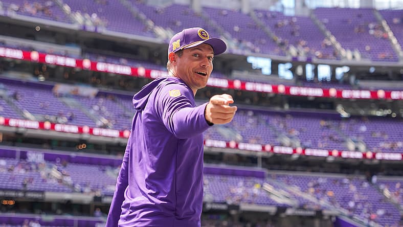 Kevin O’Connell talks with Vikings fans before a preseason game at U.S. Bank Stadium.