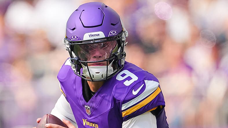 Minnesota Vikings quarterback J.J. McCarthy scrambles away from pressure against the Las Vegas Raiders during a preseason game at U.S. Bank Stadium.