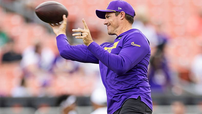 Kevin O’Connell throws a football during pregame warmups before the Vikings’ preseason game against the Browns.