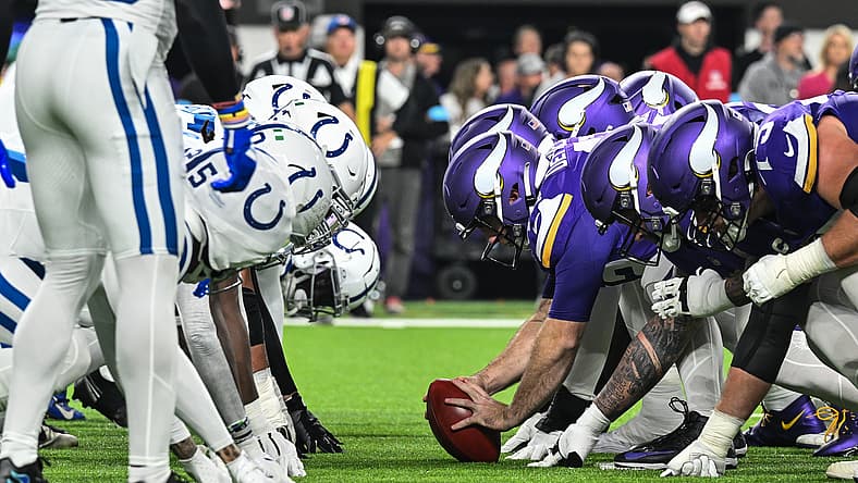 Vikings and Colts linemen collide at the line of scrimmage during a game at U.S. Bank Stadium.