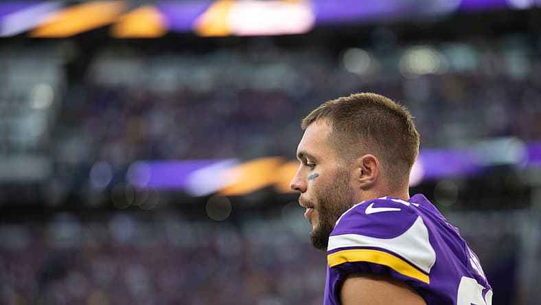 Harrison Smith stands on the field before a Vikings preseason game at U.S. Bank Stadium