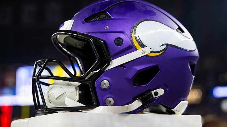 Minnesota Vikings helmet sits on the sideline before a playoff game against the Rams.