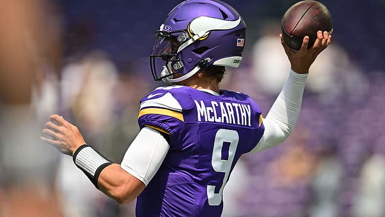 J.J. McCarthy warms up before the Vikings’ preseason game against the Raiders at U.S. Bank Stadium.