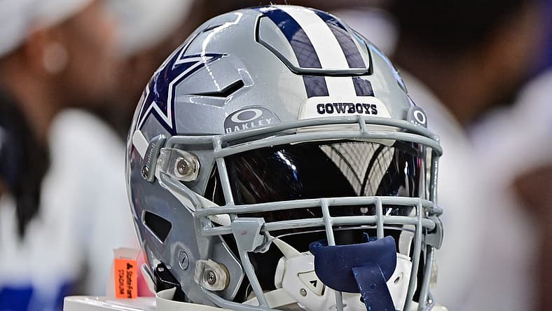 Dallas Cowboys helmet on sideline during game vs. Cardinals in 2023