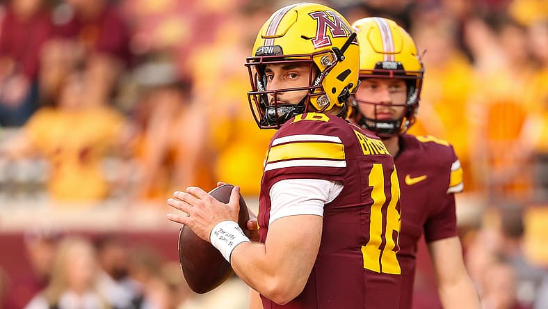 Max Brosmer warms up before the Gophers’ game against USC.