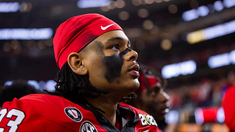 Tyrion Ingram-Dawkins lines up against TCU in the national championship game. Vikings players under 25