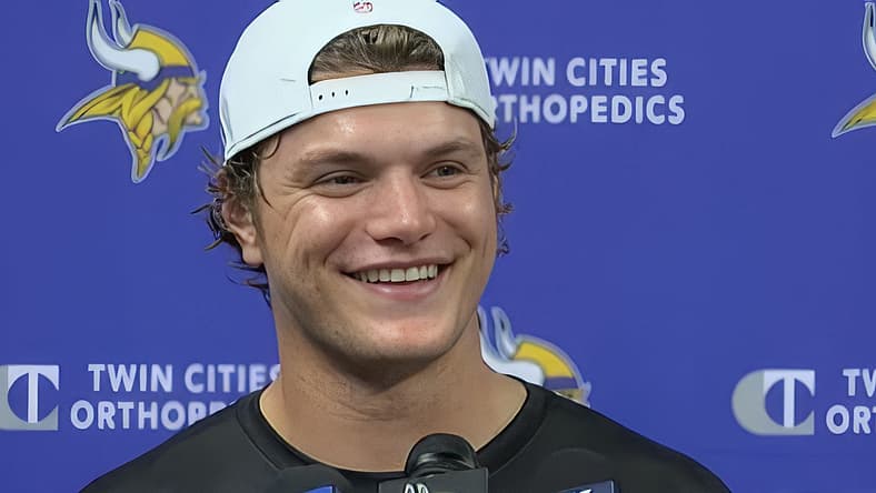 J.J. McCarthy talks with reporters during Vikings OTAs at TCO Performance Center.