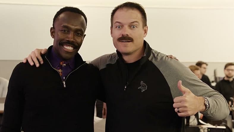Kevin O’Connell and Kwesi Adofo-Mensah stand together during a Vikings offseason appearance in spring 2025.