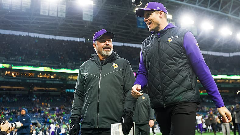 Kevin O’Connell and Mike Pettine walk to the locker room after a win over the Seahawks.