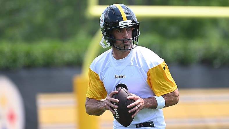 Aaron Rodgers, heavily linked to the Vikings in the 2025 offseason, at minicamp.