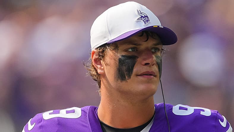 J.J. McCarthy stands on the Vikings’ sideline during the preseason game against the Texans.