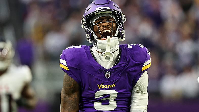 Jordan Addison celebrates fourth-quarter catch vs. Falcons at U.S. Bank Stadium.