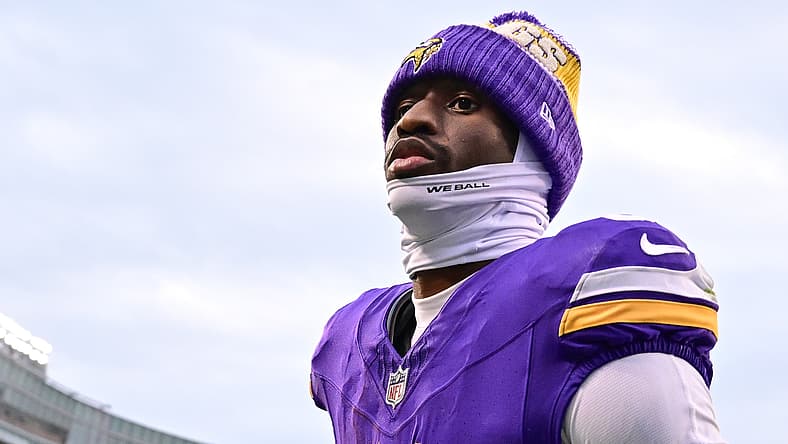 Jordan Addison walks toward the sideline after the Vikings defeated the Bears.