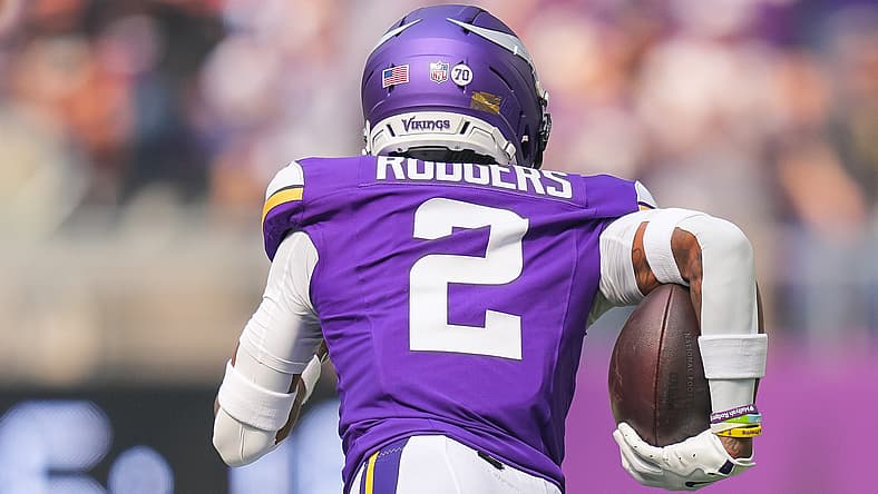 Isaiah Rodgers returns an interception against the Bengals at U.S. Bank Stadium.