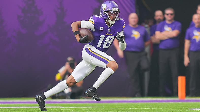Vikings wide receiver Justin Jefferson runs after the catch against the Bengals at U.S. Bank Stadium.