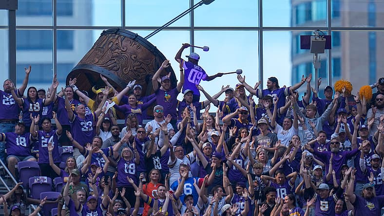 Minnesota fans stand and celebrate at U.S. Bank Stadium.