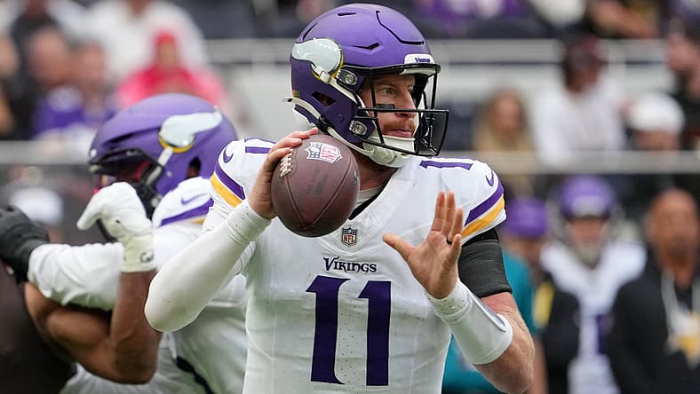 Carson Wentz drops back to pass for Vikings against Browns in London.