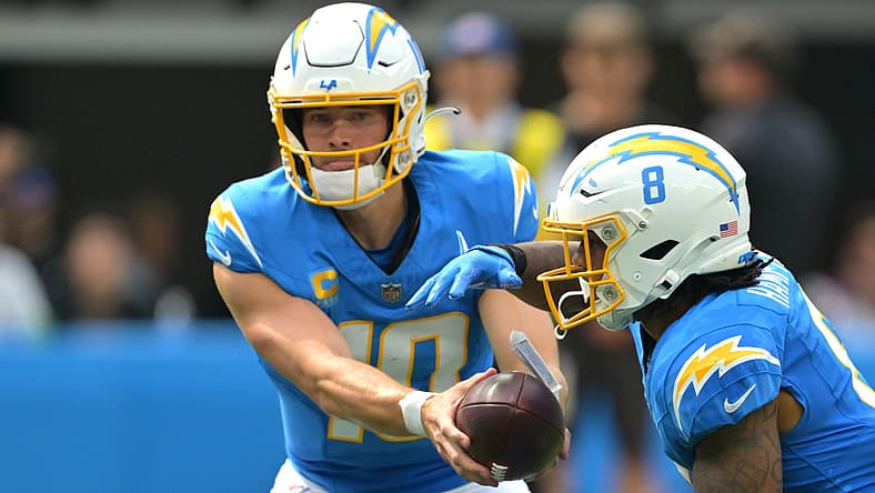 Chargers QB and RB Justin Herbert and Omarion Hampton in 2025