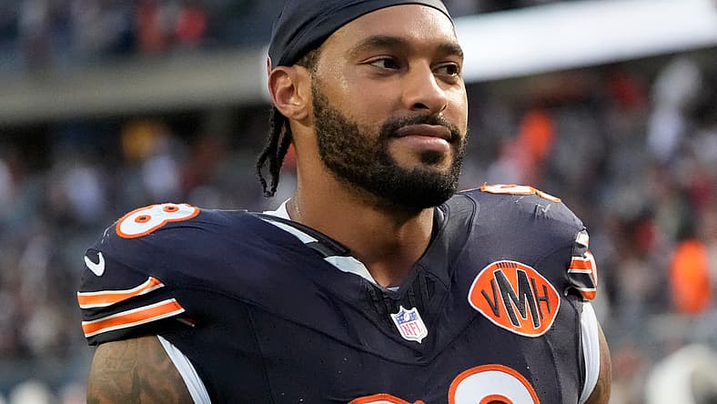 Montez Sweat stands on the field after a Chicago Bears game against the Dallas Cowboys at Soldier Field. NFC North predictions