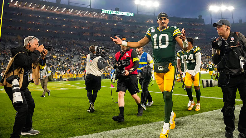 Jordan Love waves to Packers fans after facing the Bengals at Lambeau Field. Jordan Love NFL Top 100 ranking