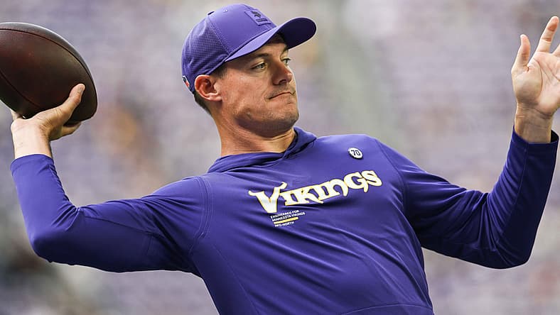 Kevin O’Connell warms up with the Vikings before facing the Bengals. Vikings playoff win drought