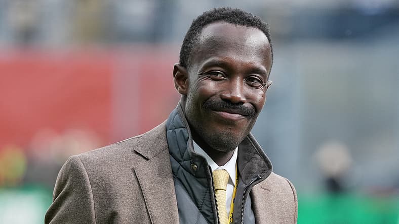 Kwesi Adofo-Mensah standing on the sideline during a Vikings International Series game at Croke Park in Dublin.