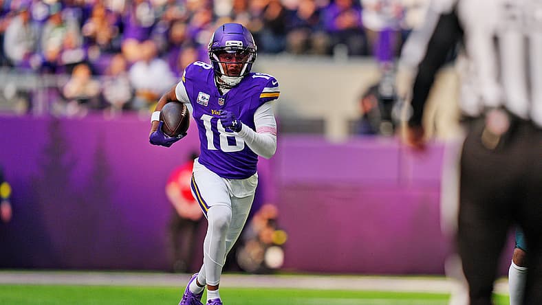 Justin Jefferson runs with the ball against the Eagles at U.S. Bank Stadium. Justin Jefferson Madden 27 rating