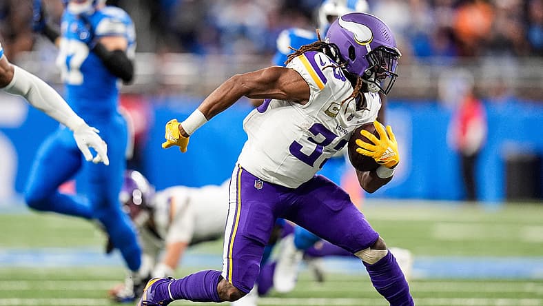 Vikings running back Aaron Jones Sr. runs with the football against the Detroit Lions at Ford Field. Vikings concerns