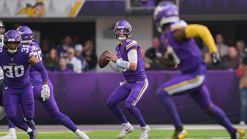 J.J. McCarthy prepares to throw against the Bears at U.S. Bank Stadium. Vikings rumors
