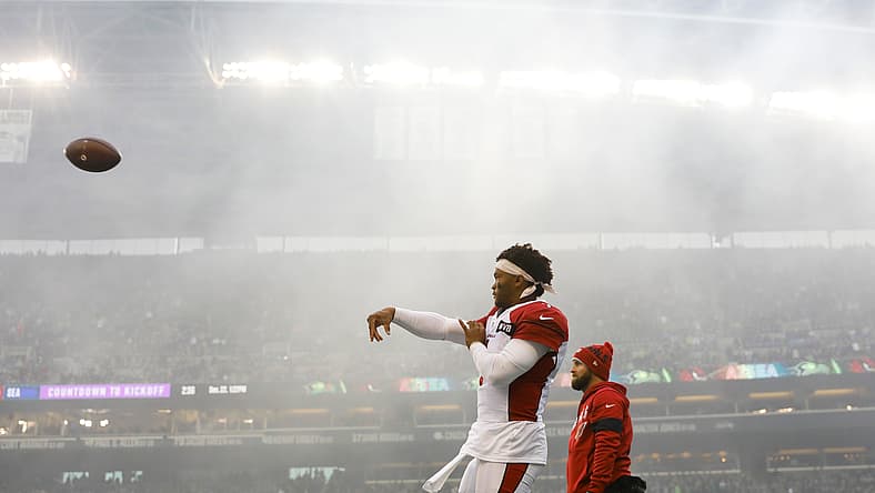 Kyler Murray gets ready before the Cardinals face the Seahawks in Seattle. Vikings rumors