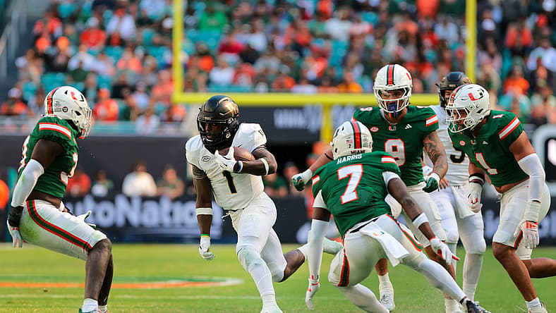 Demond Claiborne carries the football against Miami. Vikings running back weakness