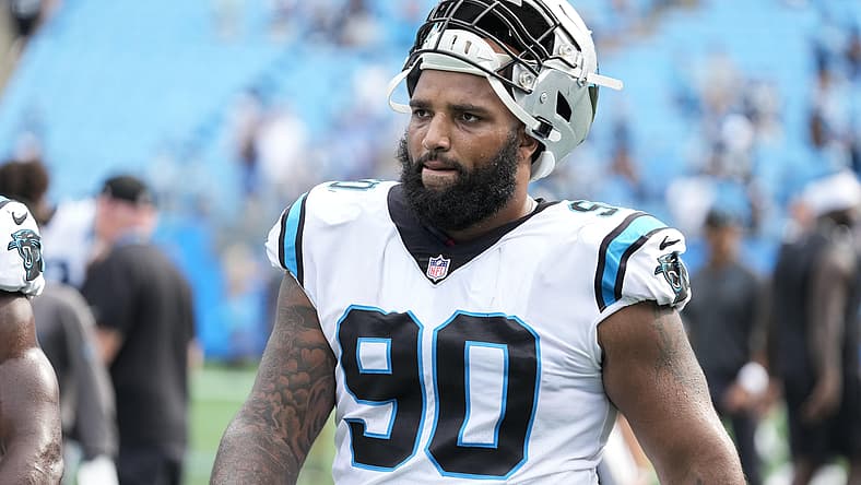 DaQuan Jones walks off the field after Panthers-Saints action.