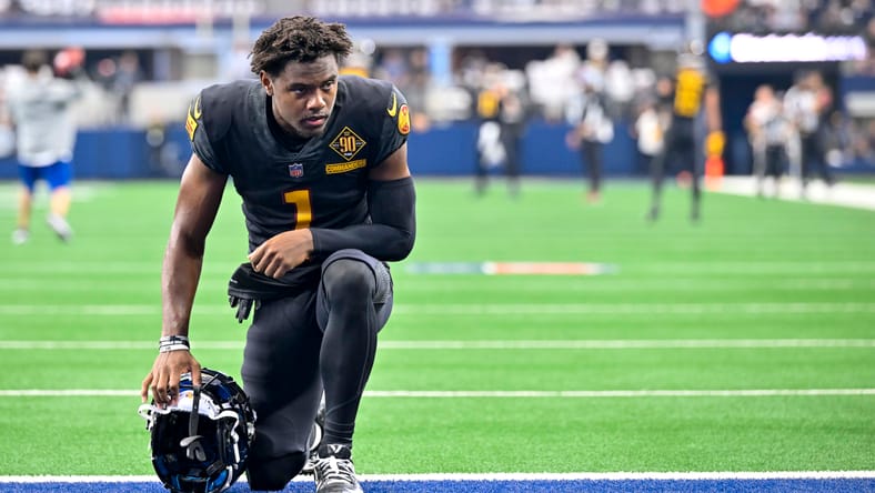 Commanders wide receiver Jahan Dotson on the field before a game at AT&T Stadium.