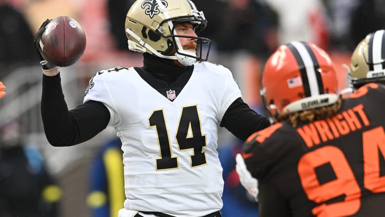 Andy Dalton throwing a pass during a Saints game against the Cleveland Browns at FirstEnergy Stadium. Vikings rumors