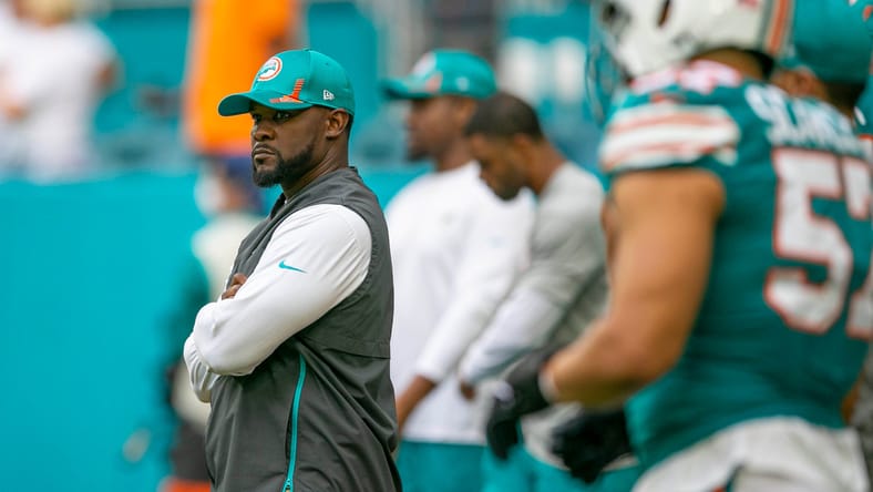 Brian Flores on the sideline before a Dolphins game at Hard Rock Stadium.