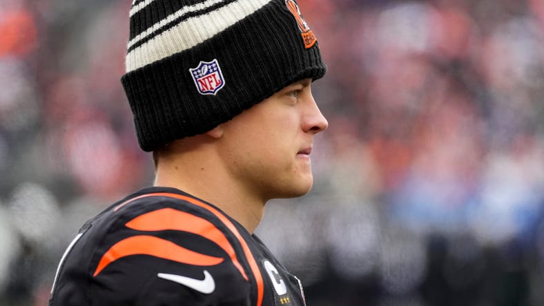 Joe Burrow standing on the sideline during a Bengals game at Paycor Stadium. Joe Burrow trade rumors Vikings.