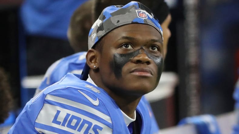 Lions WR D.J. Chark seated on bench vs Falcons.