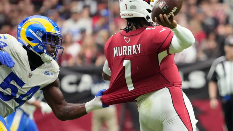 Kyler Murray is tackled by Rams linebacker Leonard Floyd at State Farm Stadium.