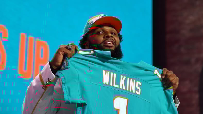 Christian Wilkins celebrates being drafted by the Miami Dolphins during the first round of the 2019 NFL Draft.