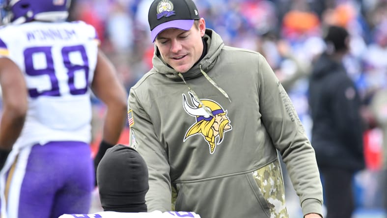 Kevin O’Connell greets Theo Jackson before Vikings-Bills game.