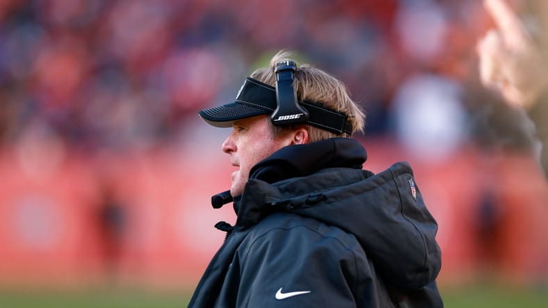 Jon Gruden coaches from the sideline during a 2019 Raiders game in Denver.