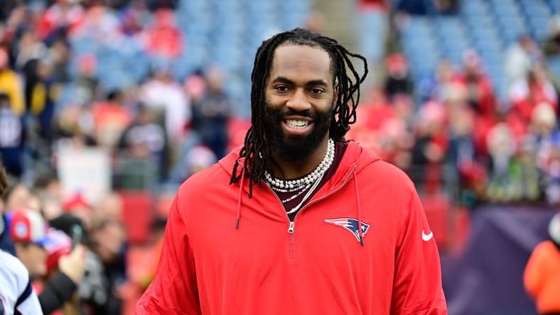 Matthew Judon greets fans before a Patriots-Chiefs game.