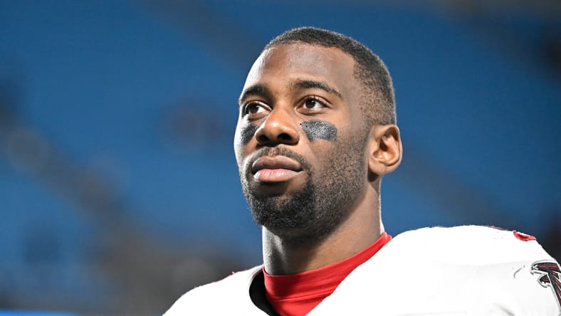 Kyle Pitts walks off the field after a game against the Panthers in Charlotte.