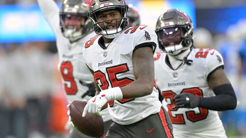 Jamel Dean celebrates a second-half fumble recovery against the Chargers.