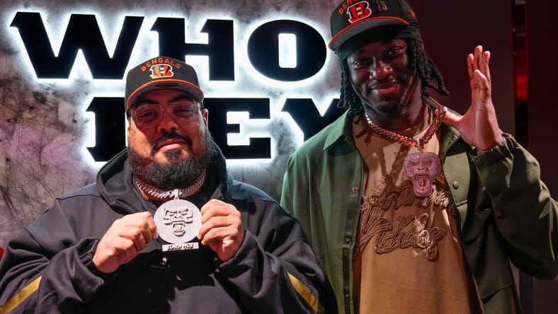 Shemar Stewart and his father Moe Marquez show off matching jewelry inside the Bengals locker room at Paycor Stadium on April 25, 2025.